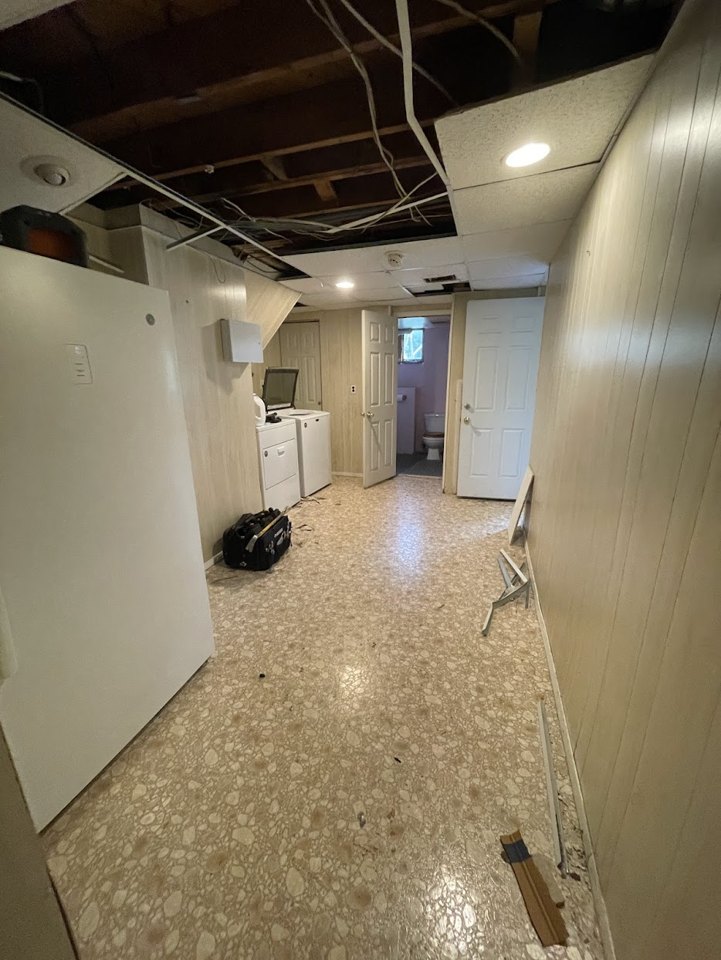 Basement living space — before project view