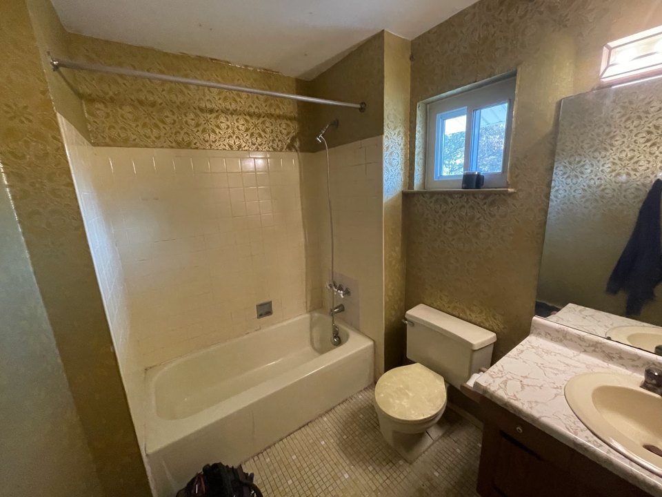 Bathroom transformation — before project view